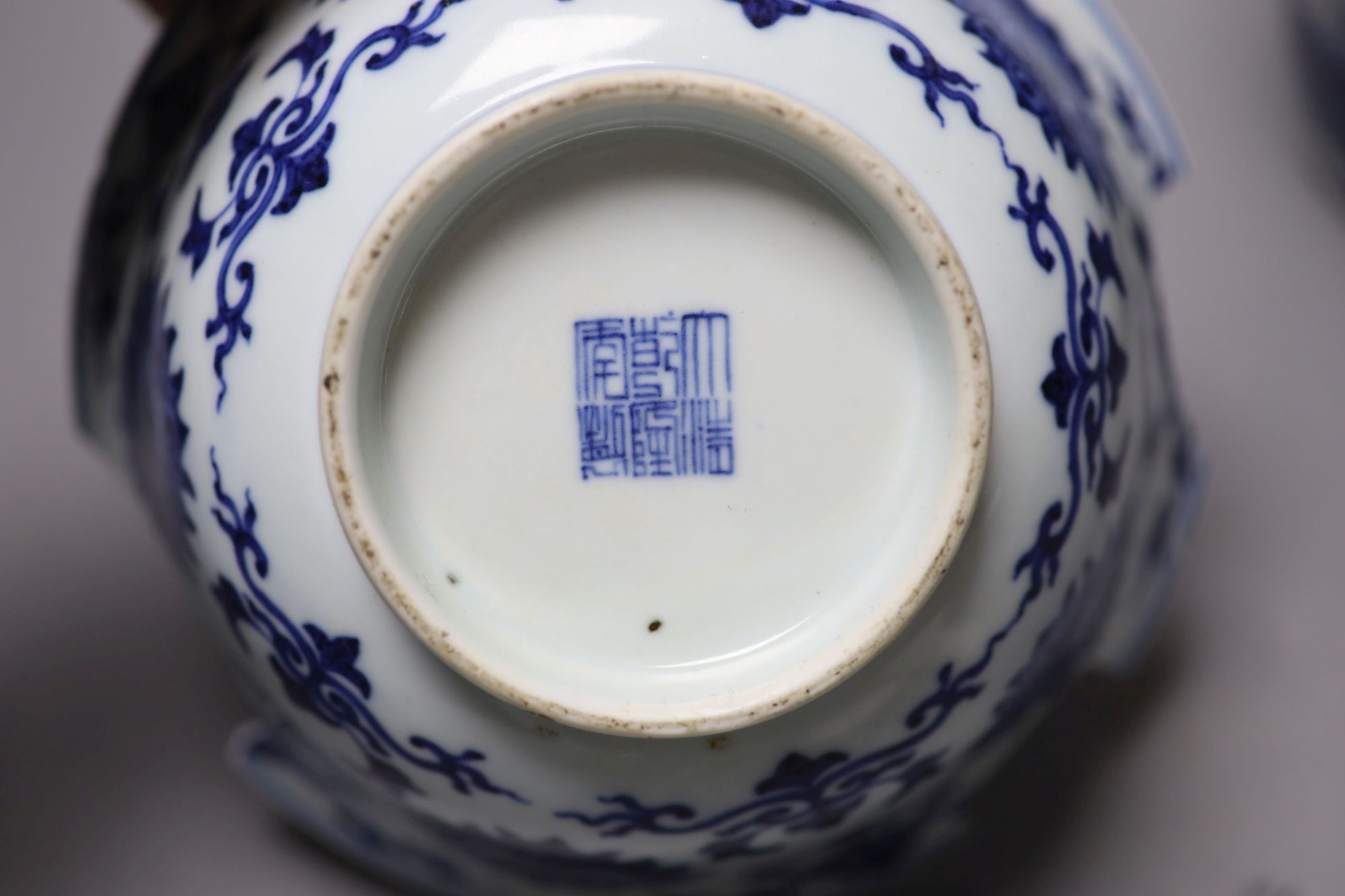 A Chinese blue and white vase, Kangxi mark, c.1900, 36cm and a similar bowl, Qianlong seal mark, early 20th century, 18.5cm